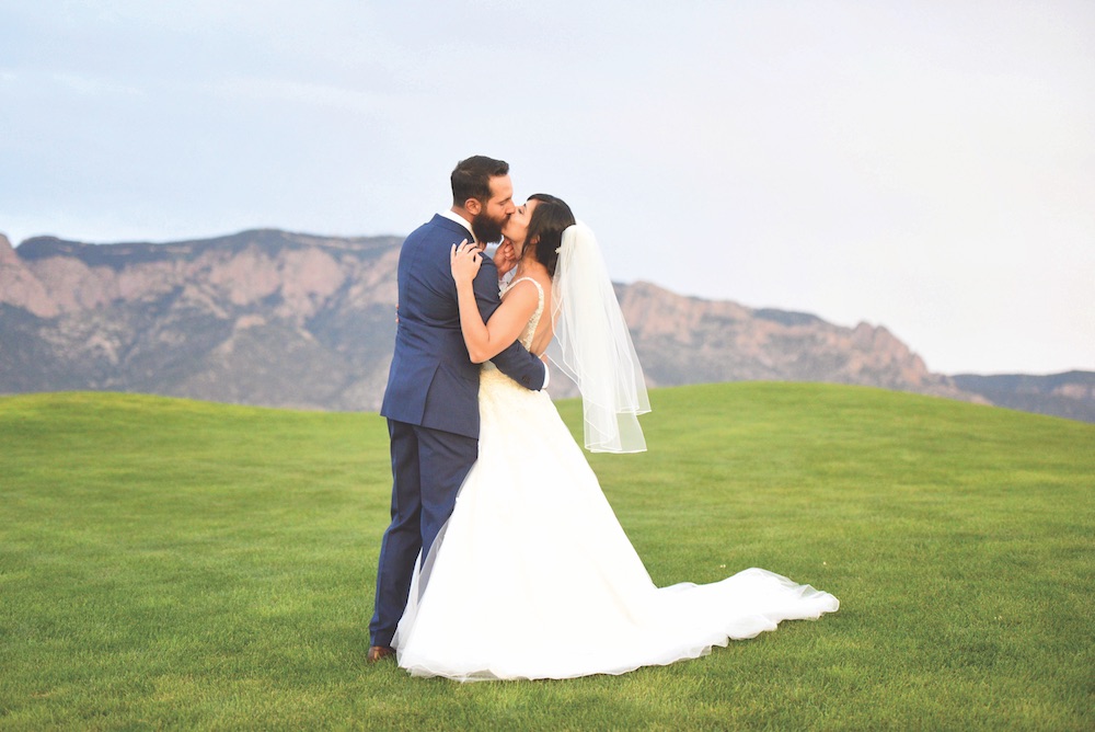 wedding photo picture love romantic kiss sandia event center