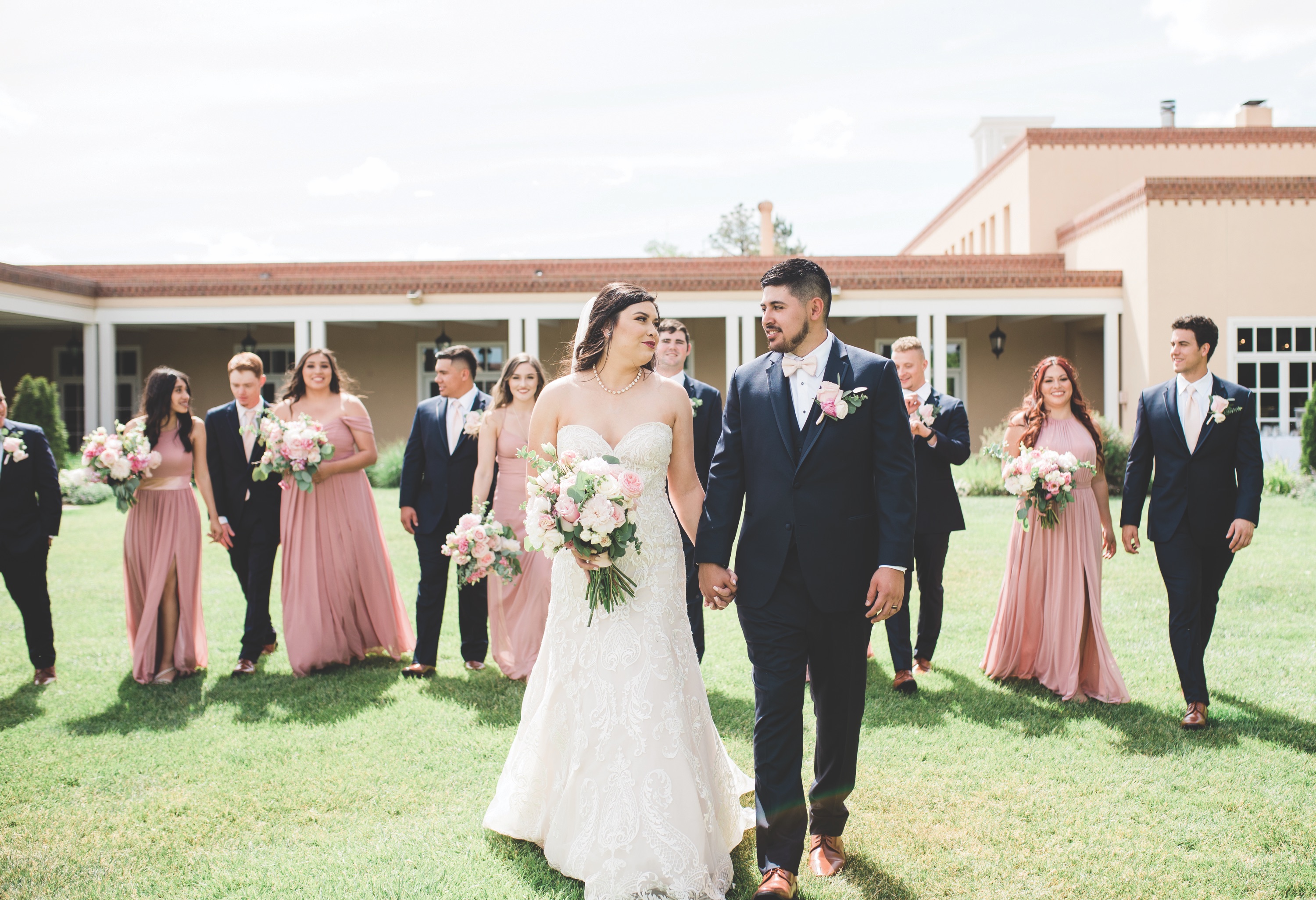 bride and groom outside with their bridesmaids and groomsmen, bride smiling, bride, new mexico bride, hotel albuquerque at old town, abq flowers, new mexico weddings, perfect wedding guide